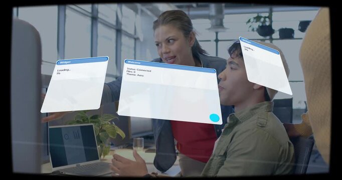 Standing woman pointing at laptop, causing faint AR widgets popping, shifting, tech checking status
