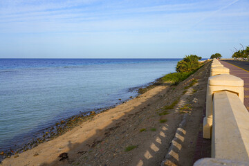 Naklejka premium Peaceful waterfront promenade overlooking the Red Sea in Umluj, Saudi Arabia