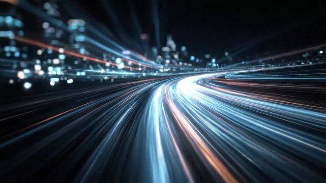 Abstract light trails on a highway at night with city lights in the background