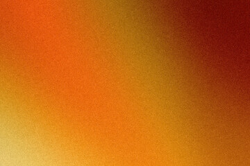 Fototapeta premium Soft orange and red tones blend in a grainy gradient background, creating a warm atmospheric texture ideal for modern branding, poster layouts, and digital presentations.