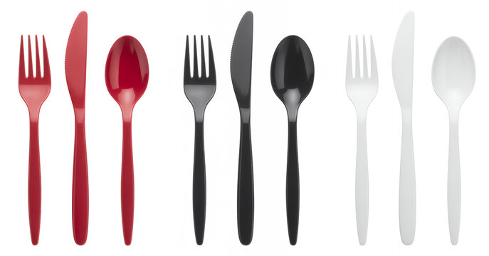 Assorted plastic cutlery on white background utensils forks knives