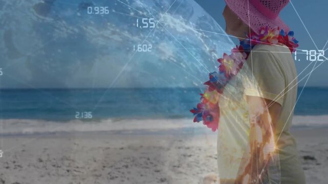 Woman standing profile at beach, globe overlay appearing, showing data, casting highlights on lei