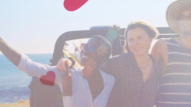 Woman extending smartphone, group linking arms on open-top, hearts growing, making travel content