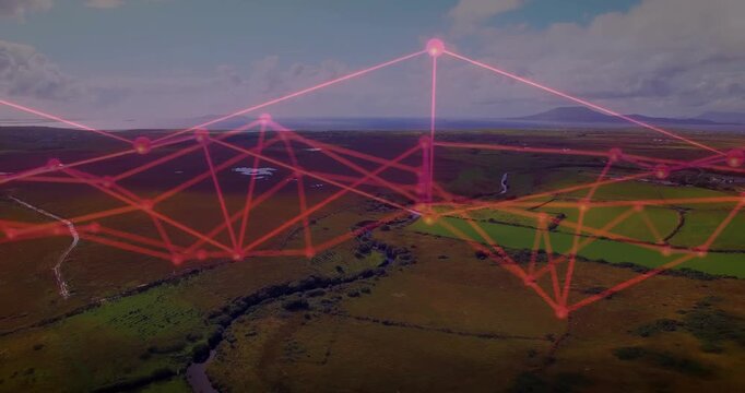 Red-pink network overlay emerging on aerial reveal, animating nodes into peaks over moor for tech