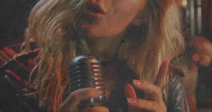 Female vocalist moving vintage mic, camera pulling back, singing, conveying emotional music