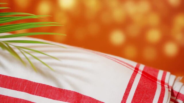 Gamosa or gamusa is a traditional textile pattern from Assam. It is a white piece of cloth with red stripes and red motifs, which is used in Bihu and resembles Ukrainian and Russian ... See More