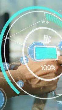 Hand holding phone tapping, tech HUD charging battery to 100% then dropping, monitoring Eco, Wi?Fi