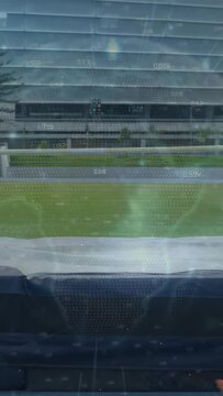 Vertical video: Sports jumper running, clearing bar Fosbury onto mat while HUD tracking training