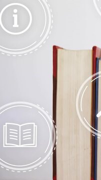 Book stack entering right, settling on desk, causing rings search icon around books for learning