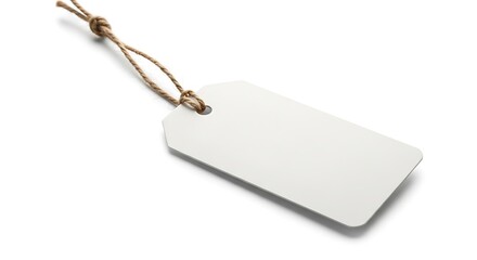 Fototapeta premium Blank white paper gift tag with rustic twine string isolated on white background for product labeling and branding