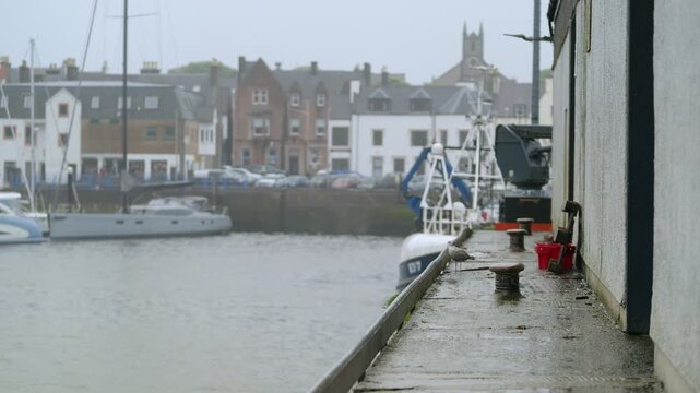 Static shot of a Grey Heron taking flight at Stornoway harbour.
