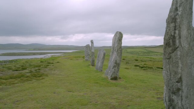 Shot pans across the Callanish standing stones, with a close up of one.