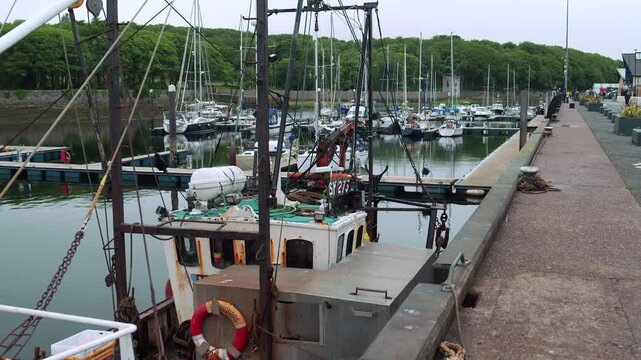 Static shot of the pontoon dock and pier at Stornoway harbour on Lewis.