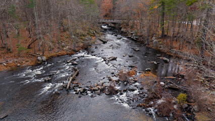 Fototapeta premium Fall aerial view featuring Packers Falls in Durham, New Hampshire