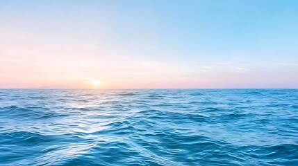 Obraz premium Tranquil Seascape at Sunset with Gentle Waves and a Colorful Sky Above the Horizon
