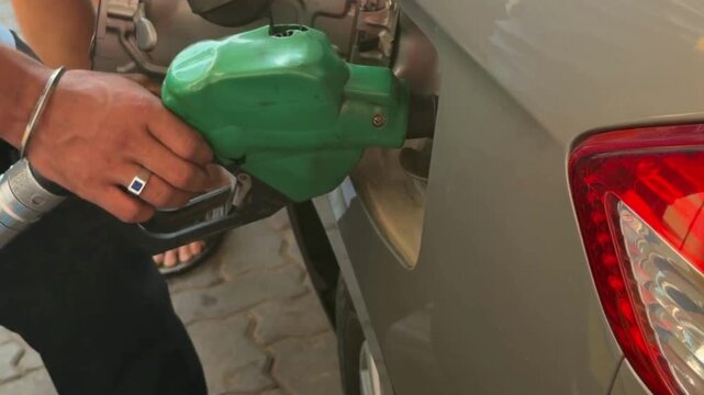 Filling petrol in a car in india