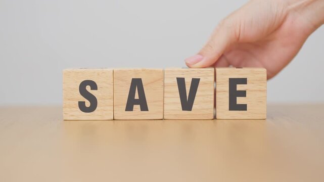hand change wooden block Save to Safe. money savings, risk management, investment, financial security and business concept