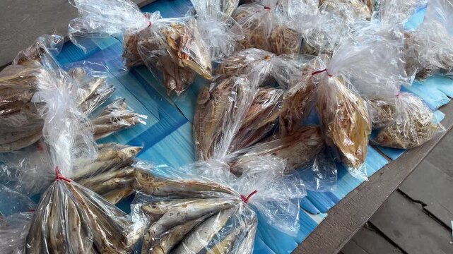 Traditional salted fish in plastic packaging at a local wet market