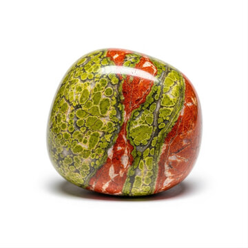 Vibrant unakite tumbled stone with green and red patterns isolated on a pristine white background