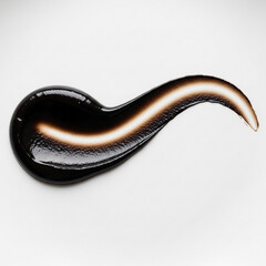 Obraz premium Minimalist charcoal hued garlic smudge for high end restaurant branding