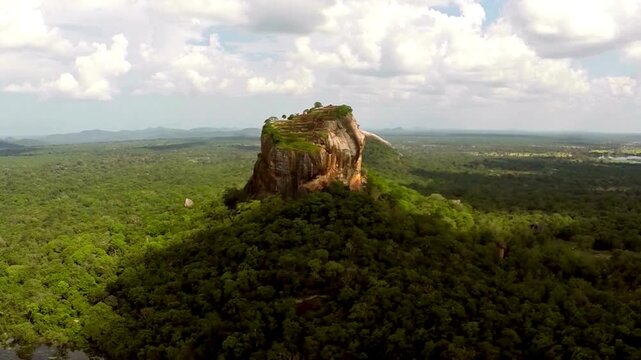 Breathtaking Aerial View of Sigiriya Rock Fortress in Sri Lanka. a UNESCO World Heritage site, isolation and strategic grandeur of this historic archaeological monument.