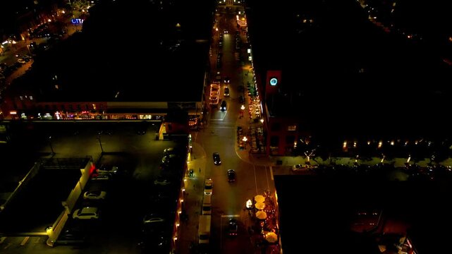 an aerial view of a downtown Ottawa nightclub area as visitors arrive for entertainment live music for bands and djs and enjoying the lively atmosphere of fun drunkeness around outdoor patios open up