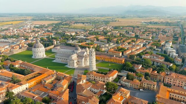 Pisa, Italy. Famous Leaning Tower and Pisa Cathedral in Piazza dei Miracoli. Summer. Morning hours. Drone footage