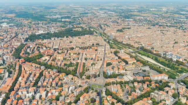 Parma, Italy. The historical center of Parma. Piazzale Tomaso Barbieri - City Square. Panorama of the city from the air. Summer day. Drone footage, Departure of the camera
