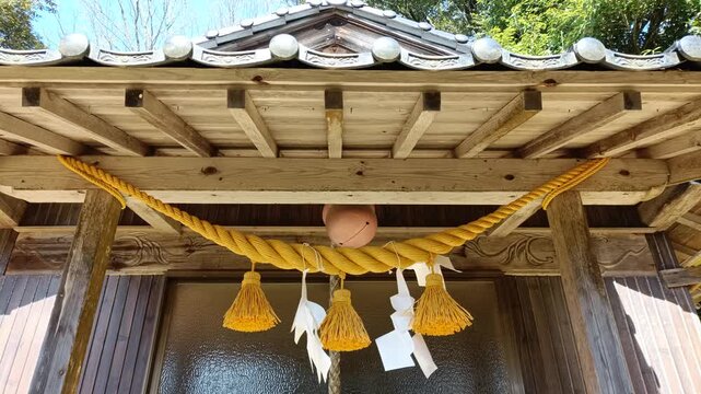 Front View of Shimenawa and Shide on Traditional Japanese Shrine Entrance