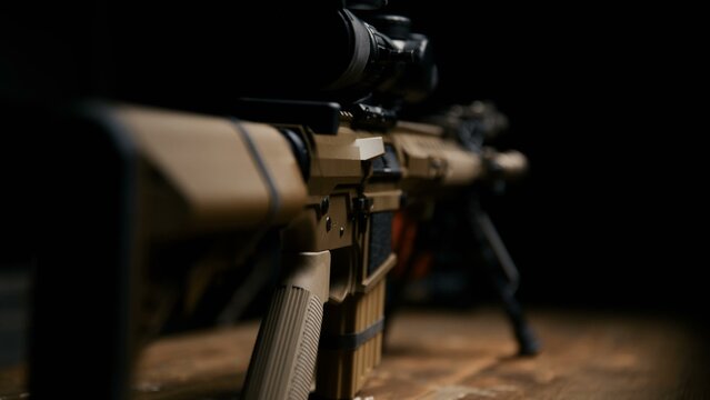 Modern tactical rifle with scope foregrip and bipod attachments