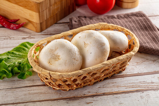 Raw white champignon mush heap