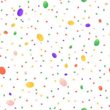 An asymmetrical seamless pattern with watercolor speckles. The multicolored dots are hand drawn for wrapping paper, children's wallpaper, cards, textiles, and posters.