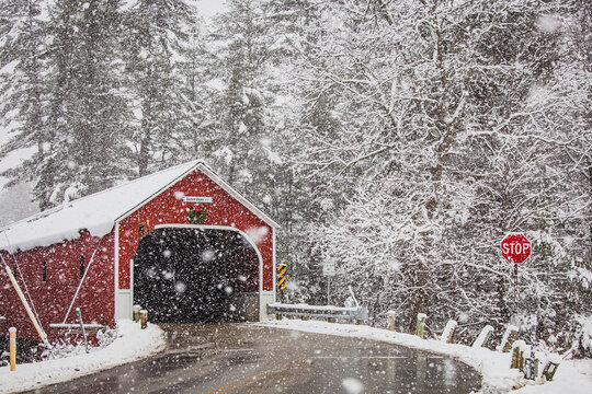 Cresson Bridge, a red covered bridge, in a winter snow storm