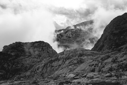 Stark black and white landscape of a rocky mountain pass