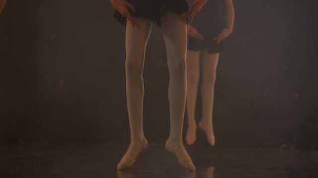 3 ballerinas dancing together medium shot