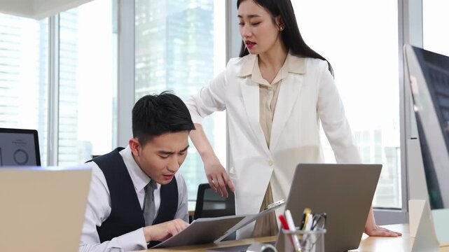 Serious Stern Superior Reprimands Remorseful Subordinate in Tense Office, boss scolding and reproaching her employee, dissatisfied with his employees work, strict business rules.