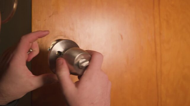 Fitting the new handle into the expanded hole in slow motion.