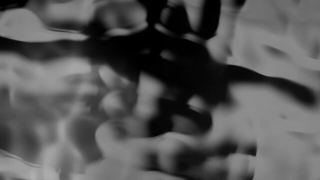 Abstract swirling smoke patterns in monochrome, evoking a sense of mystery and movement