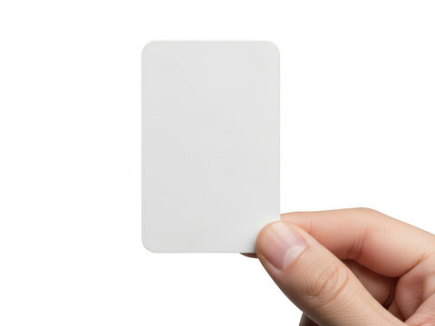 A blank white business card held between a person's thumb and index finger