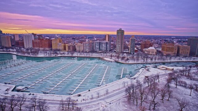 Winter sunrise drone pass across the skyscrapers of Chicago&rsquo;s Loop.