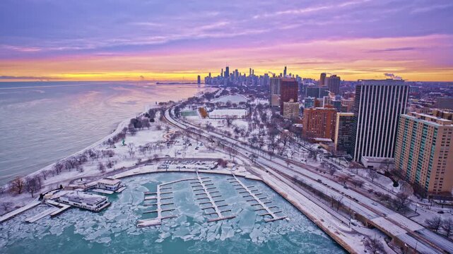 High-altitude drone shot of the Chicago Loop at dawn during wintertime.