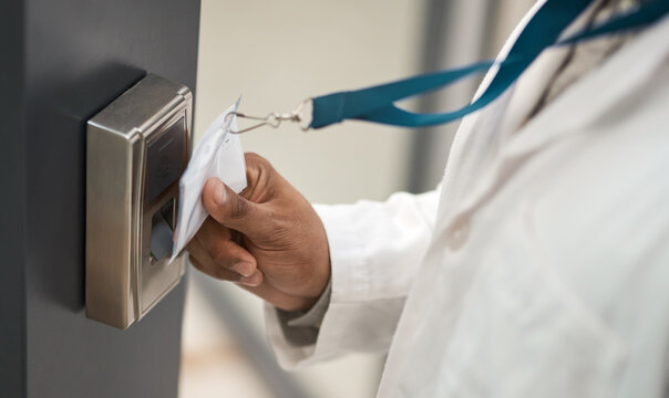Hand, scientist and machine to scan card for access, secure entry and authentication of restricted area. Person, tag and equipment to verify identity, authorized staff and biosecurity for timekeeping