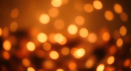 Fototapeta premium Warm golden bokeh lights in a dark background with a sense of depth and blurry texture