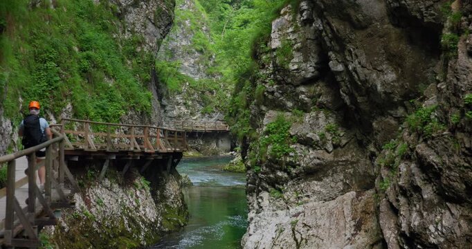 Hiker Walking Wooden Trail In Vintgar Gorge Slovenia Summer Travel