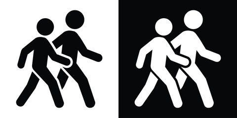 Naklejka premium Silhouette style icon of two people walking together. Vector graphic representing pedestrians, commuting, public movement, or a walking tour. Modern flat design for signage and web.