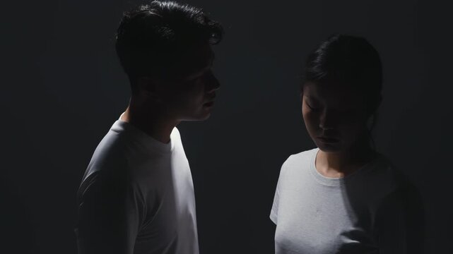 Women victim of violence abused concept. Stressful depressed young woman crying sadly covering her face from domestic violence, depressive state, mental health problem, negative emotions concept.
