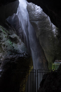 Cascate Varone waterfall in gorge with soft natural light and wet rock walls in underground cave parco grotta Italy