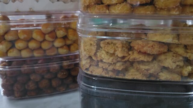 olives in a glass jar,Assorted Indonesian cookies,pastry,cake,bakery in jar,for celebrate Eid Al-Fitr and Eid al-Adha.Indonesian called kue kering