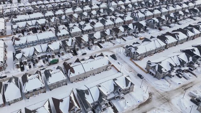 Orbiting Aerial Shot Of Urban Sprawl, Homes In A New Housing Community Neighbourhood Of Erin, Ontario, Canada.