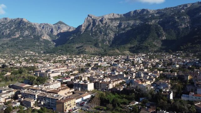 Flying away from S&oacute;ller, while revealing the Tramuntana mountain range. Mallorca, Spain.
